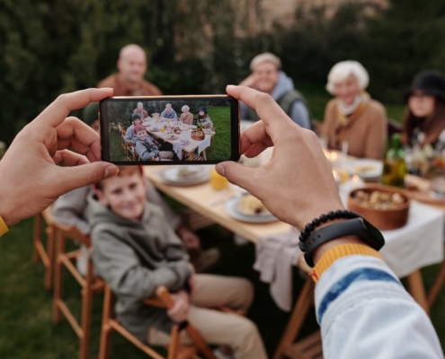 Giving Tuesday and family philanthropy with a family around a picnic table during the holidays